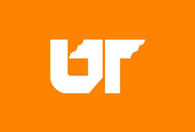 white UT icon on orange background